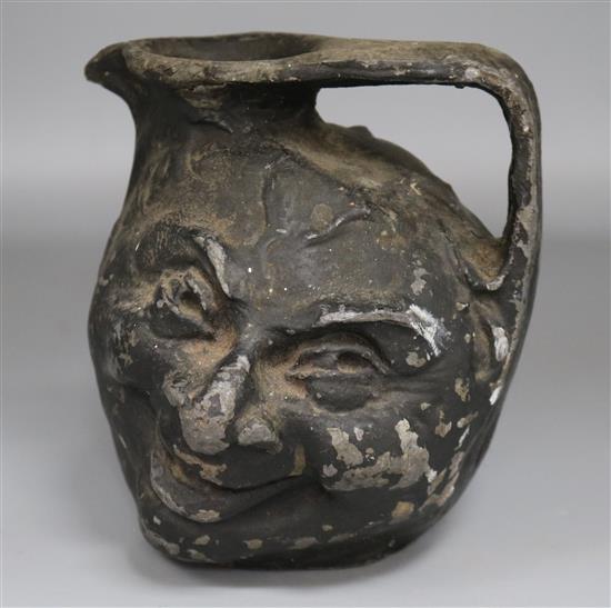 A lead jug in Martin Bros style